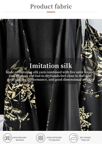 Détail du pyjama cerise montrant le tissu en satin noir avec texture florale dorée