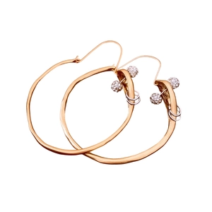 Golden irregular hoop earrings with sparkling rhinestones and matte metallic finish