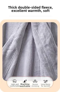 Close-up of thick purple double-sided coral fleece fabric showing soft plush texture