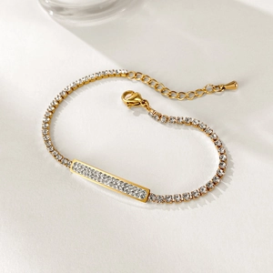 Detailed macro of gold-plated stainless steel bracelet with micro-pave zircon crystals