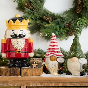 Christmas nutcracker ceramic candy jar and gnome figurines set for holiday table decor