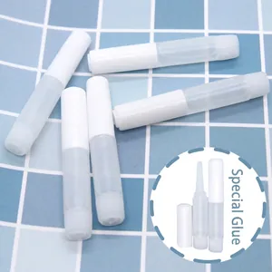 Five professional nail glues for press-on nails with white caps on a blue checkered background