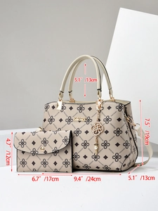 Detail of trendy tote and pouch set with geometric floral texture and gold logo accents