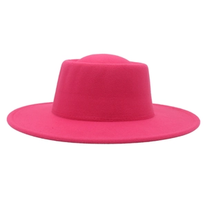 Close-up of hot pink wool felt fedora with a wide brim and premium matte finish texture