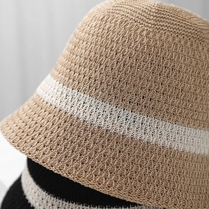 Close-up of contrast striped knit texture on breathable summer bucket hats for women