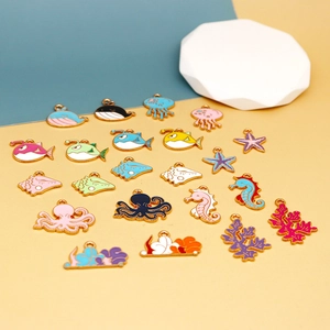 Assorted colorful enamel ocean animal pendants including seahorse, octopus and starfish