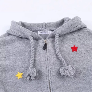 Grey knitted hooded zip-up cardigan for kids featuring red and yellow star embroidery