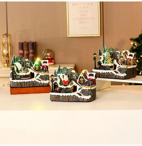 Dettaglio scena villaggio natalizio in resina con luci LED e figure festive