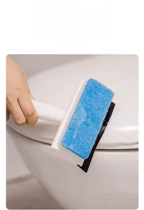 Multi-purpose sponge cleaner with rubber squeegee used on a bathroom surface