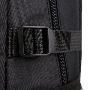 Detail shot of the durable nylon fabric, plastic adjustment buckle, and zipper of the backpack