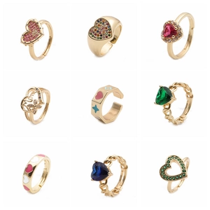 Set of 9 gold-plated heart rings with colorful zircon inlay and enamel details