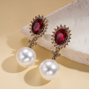 Vintage style drop earrings with red ruby crystal and large white pearl on gold base