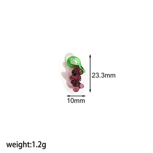 Detail view of purple grape charm with measurements 23.3x10mm and 1.2g weight