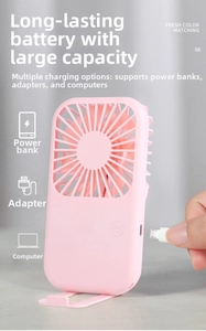 Close-up of pink mini fan with Micro-USB charging port and foldable base stand