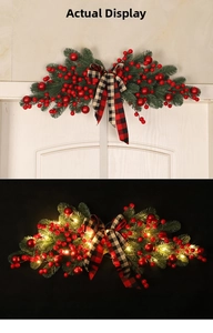 Detailed comparison of red berry Christmas swag with LED lights and plaid bow decor