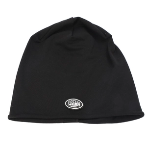 Detail of black knitted beanie featuring an oval OREMA FASHION patch and rolled edge