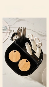 Detail view of large capacity kitchen organizer with knife rack and spice jars