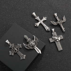 Gothic titanium steel pendants featuring lion heads, wings, and vintage cross designs