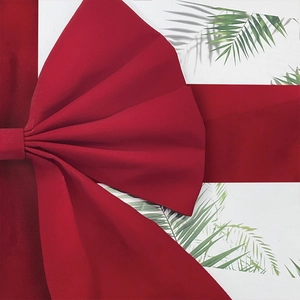 Detailed close-up showing the velvet texture and central knot of the large red Christmas bow