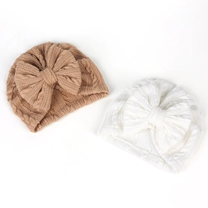 Bonnets turban en tricot pour nouveau-né blanc et beige avec gros nœud et torsades