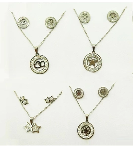 Detailed views of titanium steel jewelry sets with butterfly, heart, star and clover motifs