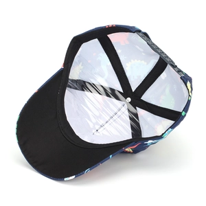 Adjustable kids baseball cap detail with navy blue dinosaur print and plastic buckle strap