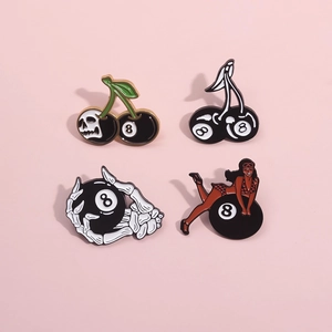 Set of four creative billiard and skull themed enamel pins with retro punk metal design