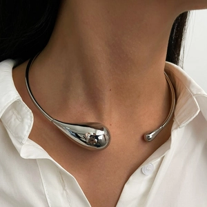 Polished silver teardrop open choker necklace featuring a minimalist mirror finish design