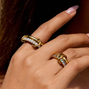 Luxurious gold-plated titanium steel ring set with zircon stones on model's hand