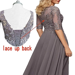 Elegant lace evening gown with a lace-up back design and flowy chiffon skirt