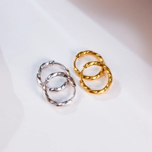 Minimalist twisted Mobius hoop earrings in gold and silver stainless steel set