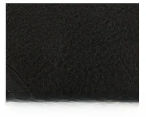 Close-up of thick black fleece lining on autumn winter baseball cap for warmth
