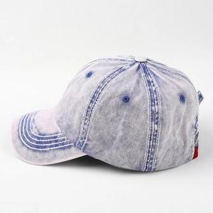 Detailed side view of washed light purple cotton baseball cap with white contrast stitching