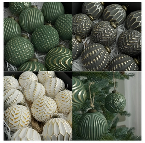 Detail of 8cm vintage Christmas balls with gold textures in green, grey and white colors