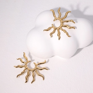 Modern gold stainless steel sunburst earrings with elegant geometric flame design
