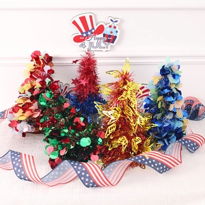 Miniature Independence Day foil trees with Happy 4th of July sign and star sequins