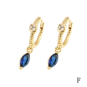 Detail view of 18K gold plated hoop earring with marquise cut blue zircon stone
