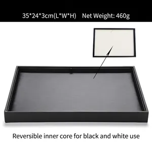Black rectangular jewelry display tray with reversible black and white insert 35x24cm
