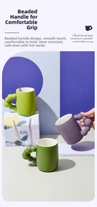 Close-up of ceramic mugs with beaded handles and matte finish in various colors