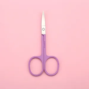 Sharp stainless steel beauty scissors with ergonomic purple handles on a soft pink backdrop