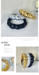 Three padded PU leather headbands in metallic gold, silver, and black finishes