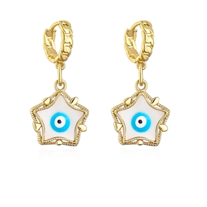 Macro detail of 18K gold plated copper star earrings with blue evil eye enamel drops