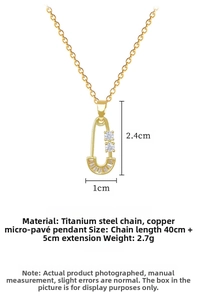 Detailed view of luxury gold titanium steel necklace with zircon safety pin pendant size 2.4x1cm
