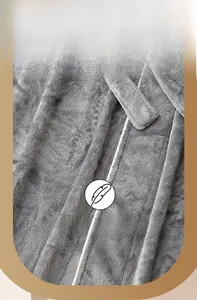 Detail of grey flannel bathrobe showing high-quality coral fleece texture and waist belt