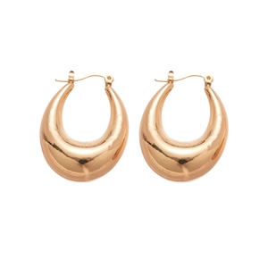 Minimalist golden C-shaped teardrop chunky hoop earrings on a clean white background
