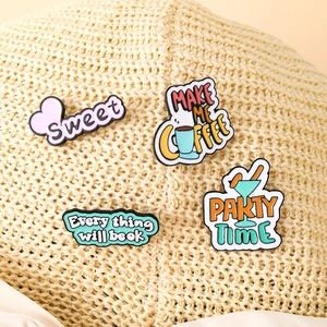 Cartoon enamel pins set with cute phrases like Sweet and Party Time on a straw hat
