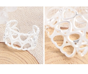 Close-up of S925 sterling silver stamp on minimalist hollow heart-shaped open ring