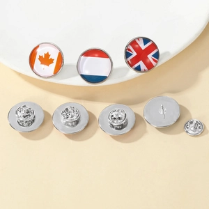 Round national flag lapel pins with Canada, Netherlands, and UK designs on metal base