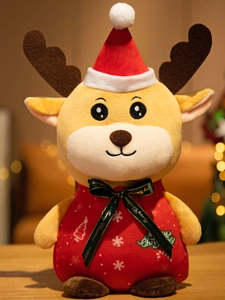 Detailed view of a plush reindeer toy wearing a red Merry Christmas outfit and a green ribbon