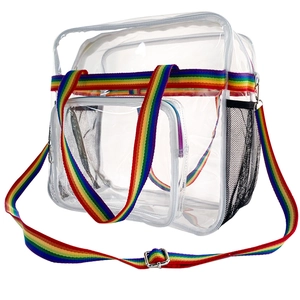 Detail der transparenten PVC-Reisetasche mit Regenbogen-Tragegurten und seitlicher Netztasche